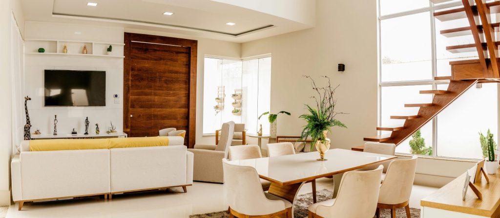 white sofa set near green indoor plant